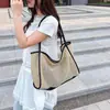 Bolso de paja tejido para mujer, gran capacidad, nuevo modelo 2026, bandolera versátil madre-hija, bolso de playa, bolsa de mano para el trabajo