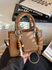 Bolso de Mano Cuadrado Pequeño Más Vendido Transfronterizo para Mujer 2026 Nuevo Retro Versátil Bolso Cruzado Moda de Nicho Súper Popular Bolso para el Trabajo