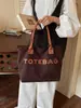 2026 Nuevo Bolso de Hombro Individual Retro con Letras para el Trabajo Gran Capacidad Estilo Bosque Artístico Popular Bolso Cruzado de Hombro Único