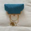 Bolsa de Ombro Simples Shell Nova Moda Primavera/Verão 2025 Bolsa com Corrente Moda Bolsa Transversal Casual Feminina