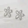 Explosiones de sonido al agitar en flores de viento pendientes de diamante pendientes nicho alto sentido joyería para orejas de acero inoxidable una generación de pelo