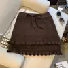 Saia de tricô de cintura alta em linha A com cordão para mulheres, novo estilo doce e picante outono/inverno, modeladora, babados, renda, minissaia em camadas