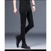 Jeans preto de alta qualidade, nova coleção de primavera, não desbota, para homens, corte slim, versátil, elástico, calça comprida de marca moderna para homens