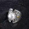 Anillo bañado en plata "el origen de todas las cosas" estilo retro diseño relieve patrón de hierba Tang anillo escudo fábrica nicho ventas directas