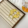 Pendientes de Hoja de Ginkgo Lugong Nuevo Tendencia de Moda para Mujer Versátiles Pendientes de Alta Gama Pendientes de Flor de Aleación