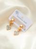 Aretes de acero de titanio de tendencia europea y americana con ojos de luna de flor, multiestilo, personalidad nicho femenina, aretes de acero inoxidable para mujer