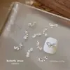 Mariposa Zircón Montón Diamante Arte de Uñas Joyería Producto Terminado Blanco Flor de Cinco Pétalos Brillante Pajarita Diamante para Uñas Accesorios Portátiles Venta al por Mayor