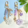 Llavero de Flor de Hilo de Colores con Cuentas Flor Azul Fresca Ramas y Hojas de Rosa Llavero de Metal Encanto de Bolso Suave y Femenino