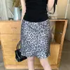 Saia retro americana com estampa de leopardo para mulheres, nova moda de verão 2026, saia lápis casual justa