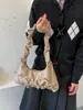Otoño 2026 Nuevo Bolso de Viaje de Nicho de Alto Valor Estampado de Leopardo con Lazo Bolso de Hombro Elegante Bolso de Axila