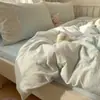 2025 Nuevo Tipo un Estilo Francés Pequeño Fresco Hilo Doble Capa Algodón Lavado Cama Juego de Cuatro Piezas 1.8 Funda de Edredón Juego de Tres Piezas para Dormitorio