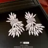 Pendientes de Plata Estilo Europeo y Americano con Alas de Cristal Incrustadas de Diamantes, Estilo de Lujo Ligero, Diseño Único y Exagerado, Pendientes de Nicho al por Mayor