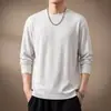 Camiseta de manga longa masculina de alta qualidade, estilo americano "old money", com textura vertical, para outono, corte solto, versátil, simples, com gola redonda, peça básica de malha