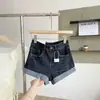 Shorts de mezclilla estilo americano para mujer con pedrería, diseño de nicho para primavera/verano, corte ajustado, tiro bajo, que realzan la figura, hot pants que se ajustan a las caderas
