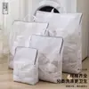 Bolsa de malla tipo panal para la colada, diseñada para usar con lavadoras, protege la ropa de la deformación durante el lavado a máquina, y está disponible para venta al por mayor