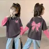 Camiseta de Manga Larga de Algodón Puro para Niñas Cuello Redondo Estampado de Dibujos Animados Estilo Nuevo 2026 Elegante Estilo Coreano Bloque de Color Camiseta Básica
