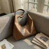 Bolsa de Verão Feminina Versátil de Grande Capacidade 2026 Nova Vintage de Ombro Único Estilo Balde com Design Texturizado para o Dia a Dia Bolsa Tote