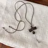 Nuevo collar retro artístico de nicho estilo chino, de capas de madera y piedra, para mujer, cadena larga para suéter con cordón de cuero ajustable