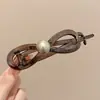 Pinza para el pelo de estampado a cuadros para mujer, nuevo modelo 2026, pinza ovalada hueca para la parte trasera de la cabeza, pinza de pico de pato grande, accesorio para el cabello de alta gama