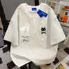 Camiseta de algodón 100% puro, marca de moda popular, diseño falso de dos piezas, cuello redondo, manga corta, para hombres y mujeres, top de verano holgado, corte ajustado, estilo Ins