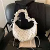 Bolsa de ombro única estilo Ins moda nó de laço design de nicho bolsa de bolinho para o dia a dia bolsa de axila plissada de bolinhas