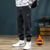 Novos estilos de outono e inverno de calças masculinas para exportação: calças jogger de veludo cotelê, forradas com fleece, casuais, esportivas, com punhos elásticos, caimento solto