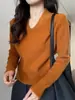 Suéter de punto sin mangas con cuello en V color albaricoque para mujer, nuevo estilo otoño e invierno 2026, adecuado para usar en capas o solo, top de punto ajustado