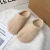Nuevas zapatillas cálidas de suela plana para invierno 2026 de comercio exterior para uso en exteriores, antideslizantes, cálidas zapatillas para el hogar, estilo Birkenstock para mujer