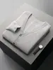 Cárdigan de lana pura 2026 otoño e invierno para hombre, cuello en V, camiseta base de capa de aire, chaqueta cálida casual de negocios para mediana edad