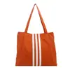 Bolso tote de lona retro, casual y espacioso para mujer, nuevo estilo 2026, bolso de hombro moderno, ligero y a la moda, adecuado para ir al trabajo