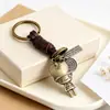Llavero Punk Creativo de Aleación de Oso de Dibujos Animados para Hombre y Mujer, Pequeño Regalo, Vintage Tejido de Cuero Vacuno, Colgante para Llaves por Lote