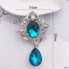 Novos acessórios de pingente de liga DIY Pingente do Deus Sol Broche de pedra Pingente de flor de liga Pérola Diamante Joias Venda por atacado