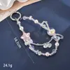 Nuevo colgante de manzana y mariposa con cuentas hecho a mano para teléfono, con un toque de alta gama, charm de cadena doble para bolso, cadena para colgar el teléfono, regalo