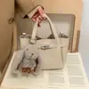 Bolsos Pequeños de Moda de Este Año para Mujer, Otoño e Invierno Retro 2025 Nuevos Bolsos de Hombro Cruzado de Nicho Madre-Hija, Bolsos Cubo