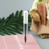 Fabricantes suministran envases transparentes redondos para tubo de máscara de pestañas cosméticos botellas de líquido para crecimiento de pestañas