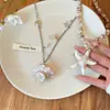 ¡Fiesta en la Isla! Collar Largo Beige de Estrella de Mar y Caracola Nuevo Estilo 2026 Vacaciones en la Costa Accesorio de Alta Gama