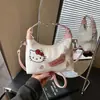 Bolsa Infantil Simple y a la Moda Bolso de Mano de Gato Bolsa de Mujer 2026 Nuevo Estilo Lindo Dulce Elegante Bolso de Hombro Cruzado para Viaje