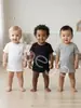 Camiseta para Niños Bebé Algodón Manga Corta Niños Niñas Color Sólido Cuello Redondo Superior Estampado de Logo Texto Estampado Camiseta Fábrica de Origen