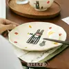 Um conjunto de louças para família de quatro pessoas, pais e filhos, presente para uso doméstico, tigela prato tigela prato de cerâmica tigela de arroz prato tigela caixa de presente