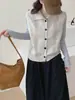 Nuevo estilo otoño 2026 chaleco cárdigan de punto hueco con solapa, chaleco suéter sin mangas de color liso en capas para mujer, moderno