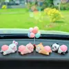 Adornos para coche en línea rojo caricatura lindo Q juego trasero muñeca consola central del coche juguete de descompresión decoraciones de animales