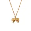 Moda Transfronteriza Europea y Americana Exquisito Combinable para Todo Nicho Acero Inoxidable de Alta Calidad Chapado en Oro de 18 Quilates Collar Simple con Lazo Dorado