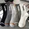 Calcetines Zhuji para Hombre Otoño e Invierno Engrosados Cálidos, Desodorantes, Absorbentes de Sudor y Transpirables Calcetines Deportivos de Largo Medio Calcetines de Pareja Modernos
