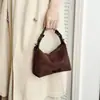 Bolso de mano elegante y versátil para mujer, perfecto para ir al trabajo, con un diseño único y una nueva colección 2026. Se puede llevar en la mano o usar como bolso de hombro o bolso cruzado.