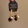 Pendientes de Ojo de Tigre Maillard Otoño e Invierno para Mujer, Pendientes de Botón Elegantes con un Toque de Lujo, Lujo Ligero, Nuevos Accesorios Populares para Orejas 2026