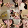 Pendientes de aro grandes geométricos con acabado cepillado, pendientes exagerados de lujo ligero de alta gama, pendientes elegantes de nicho de lujo ligero metálicos mate