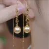Novedad 2025 Línea de Oreja con Borla de Perlas Champagne Pendientes Largos de Perlas a la Moda Elegantes Accesorios para Orejas de Lujo Ligero para Mujer