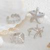 Joyería Transfronteriza Europea y Americana Anillo de Metal Estrella de Mar Estilo Playa Océano Anillo Ajustable de Imitación de Perla y Caracola Exagerado para Mujer
