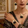 Conjunto de Gargantilha e Brincos Bohemianos Tendência Cruzada Europeia e Americana com Pingente Pequeno E Inlaid de Turquesa Venda por Atacado
