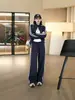 Conjunto esportivo casual estilo europeu para mulheres, nova coleção outono 2026, conjunto de duas peças da moda com cardigã e calça de perna larga para baixinhas
